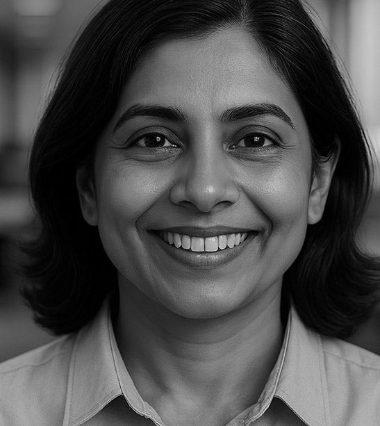 Black and white portrait of a woman with a blurred background