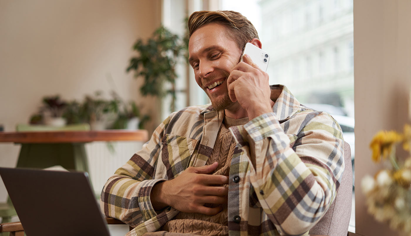 Man on phone talking about prescription treatments
